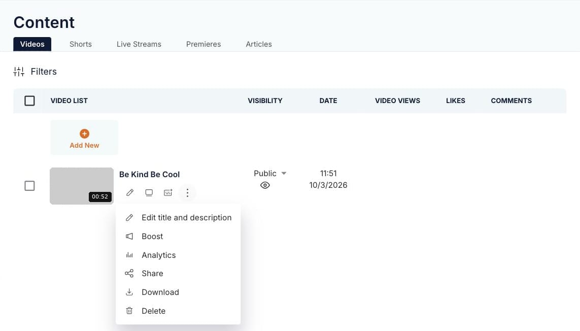 Creator Studio 的 Content 頁面（Videos 分頁），影片旁的 ⋯ 選單已展開，顯示 Edit title and description、Boost、Analytics、Share、Download 及 Delete 選項
